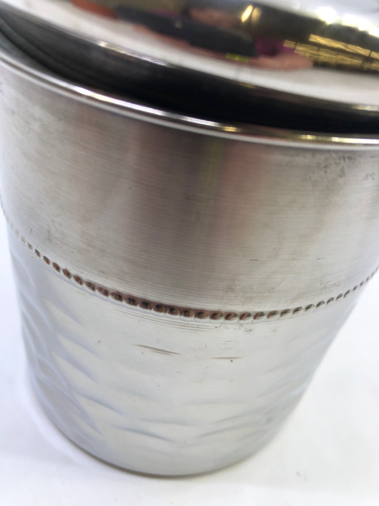 METAL DIMPLED CANISTER.