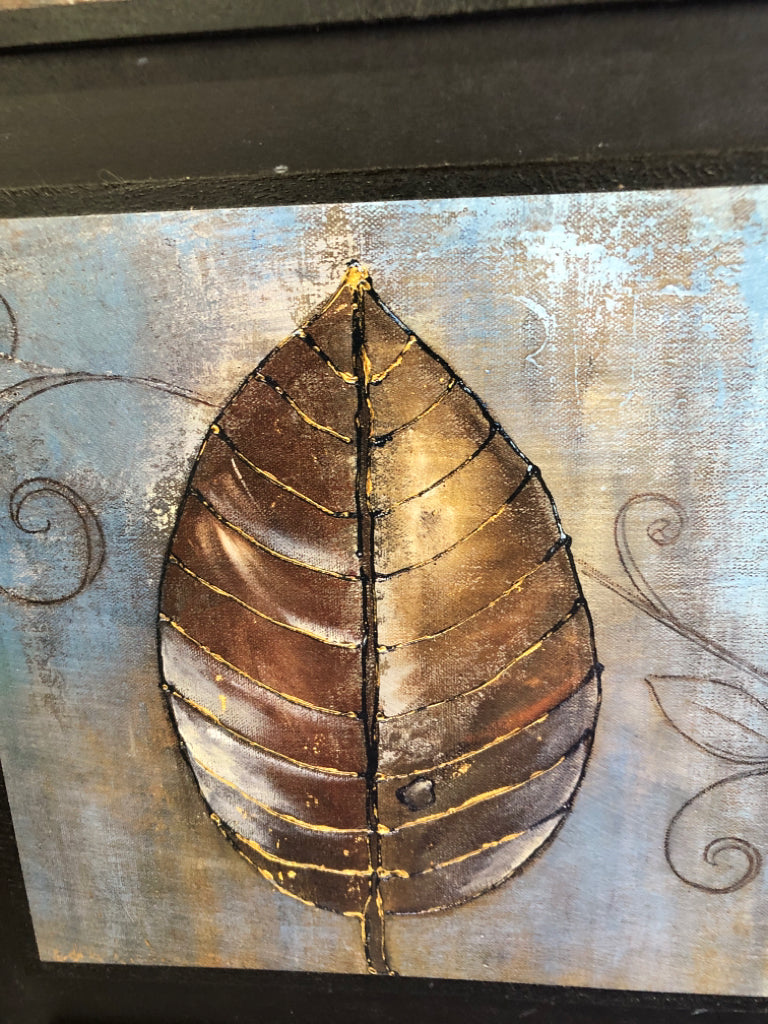 WOOD PAINTED LEAVES IN BROWN FRAME.