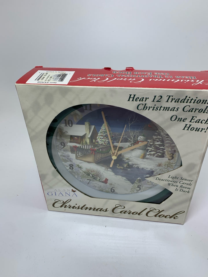 NIB CHRISTMAS CAROL CLOCK.