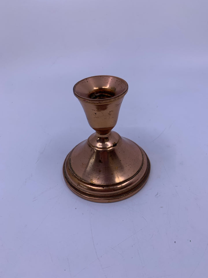 HEAVY TARNISHED SHORT COPPER TAPERED CANDLE HOLDER.