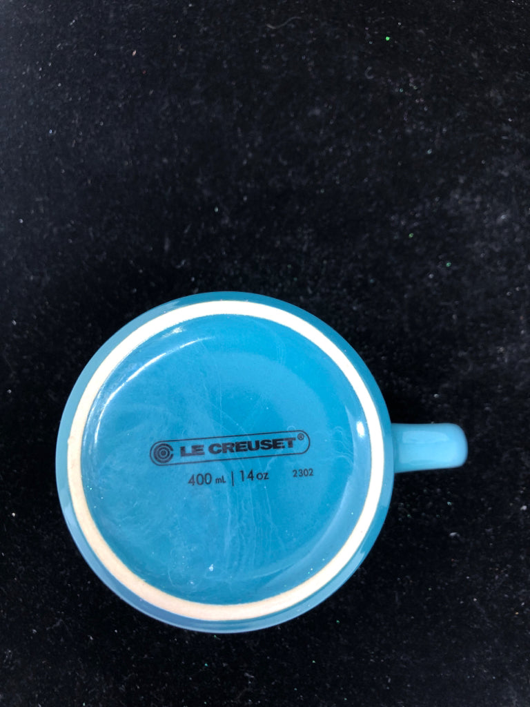 AQUA LE CREUSET MUG.