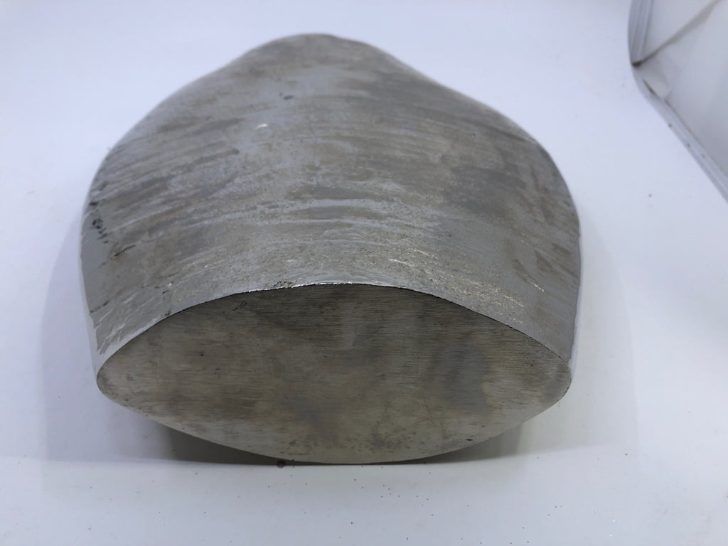SILVER TEXTURED METAL VASE.
