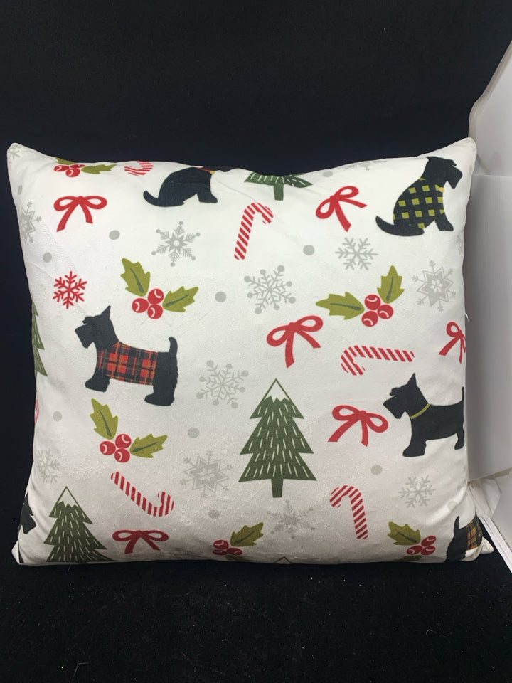 DOG AND HOLLY CHRISTMAS PILLOW.