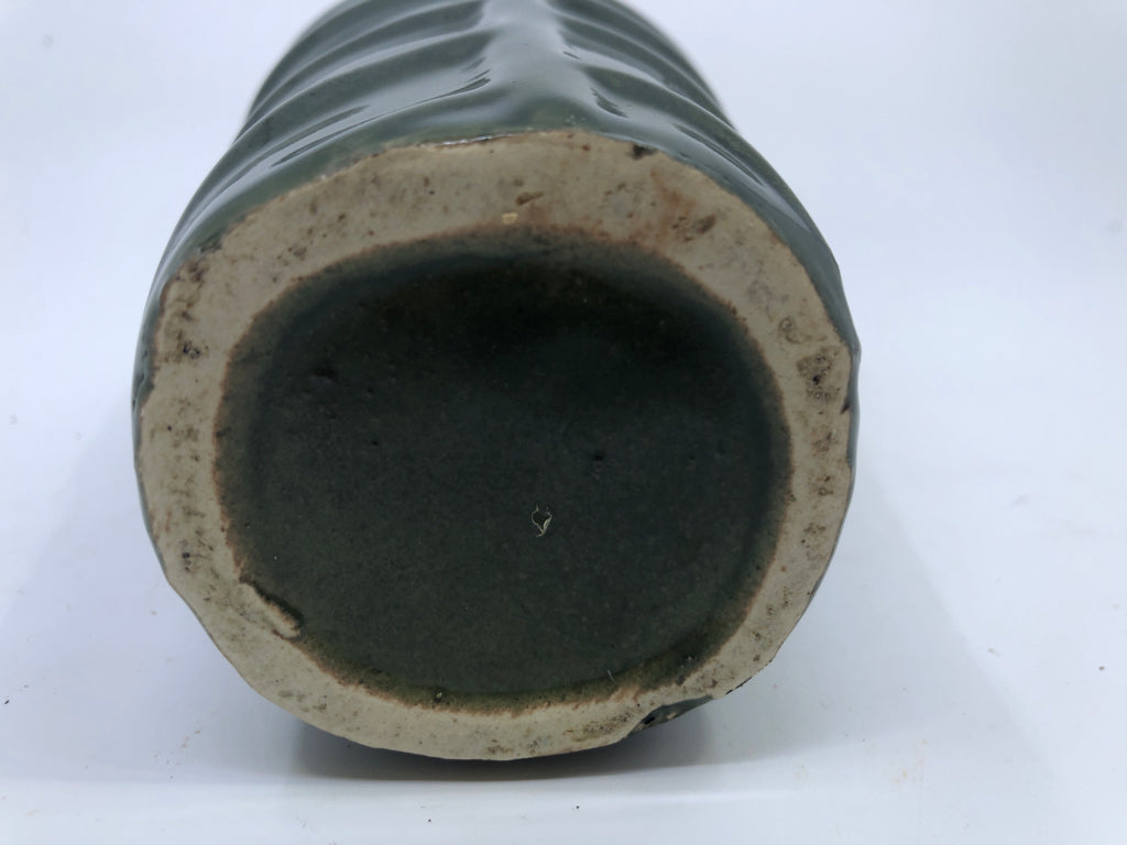 GREEN RIBBED CERAMIC VASE.