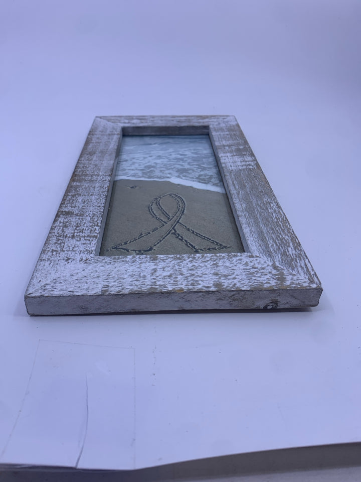 DISTRESSED FRAME BEACH SCENE.