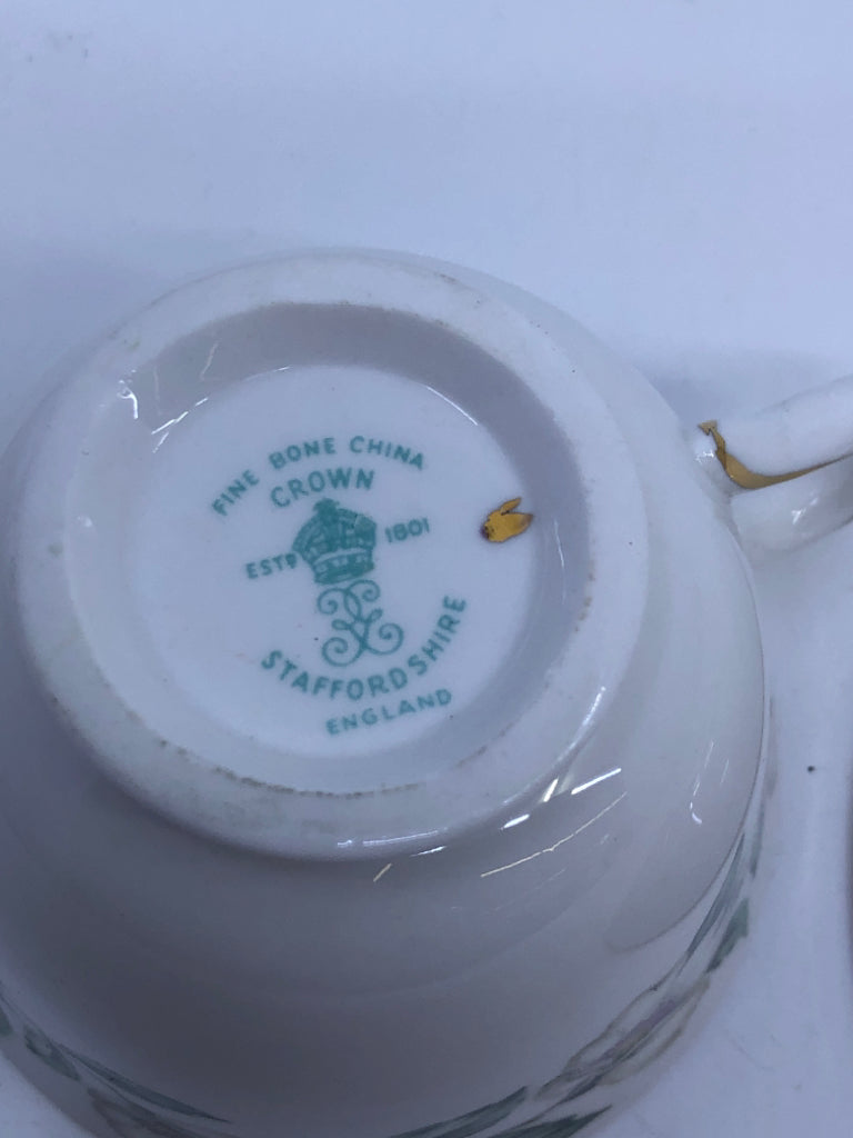 VTG WHITE FLORAL TEACUP AND SAUCER.