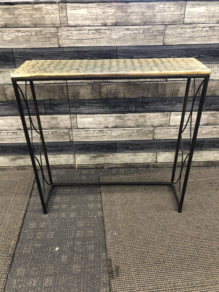 NARROW TABLE W/ GOLD ETCHED CERAMIC TOP & METAL SIDES.