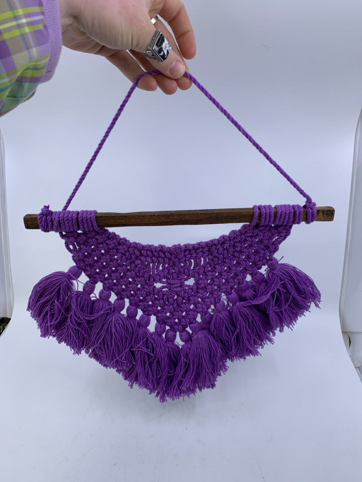 DARK PURPLE MACRAME ON WOOD DOWEL.