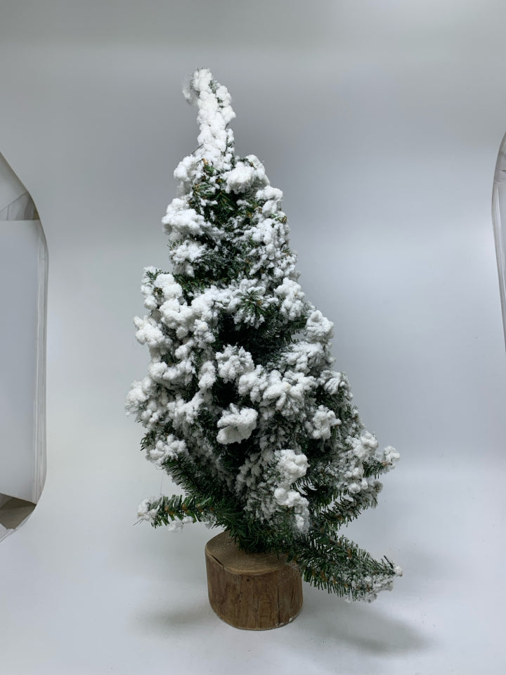 FLOCKED PINE TREE W/ WOOD SLAB BASE.