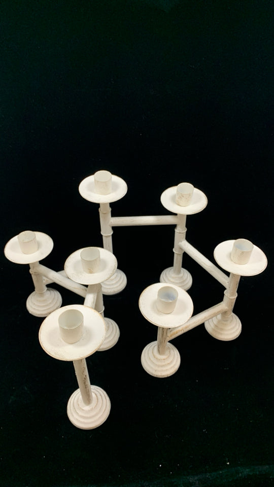 7 SECTION FOLDING WHITE METAL DISTRESSED TAPER HOLDER.