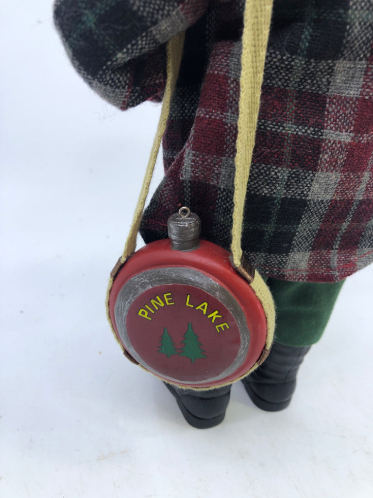 RESIN SANTA W/ PLAID FLANNEL HOLDING LANTERN.