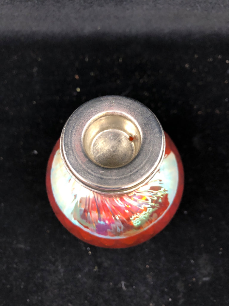 ORANGE GLASS TAPER CANDLE HOLDER.