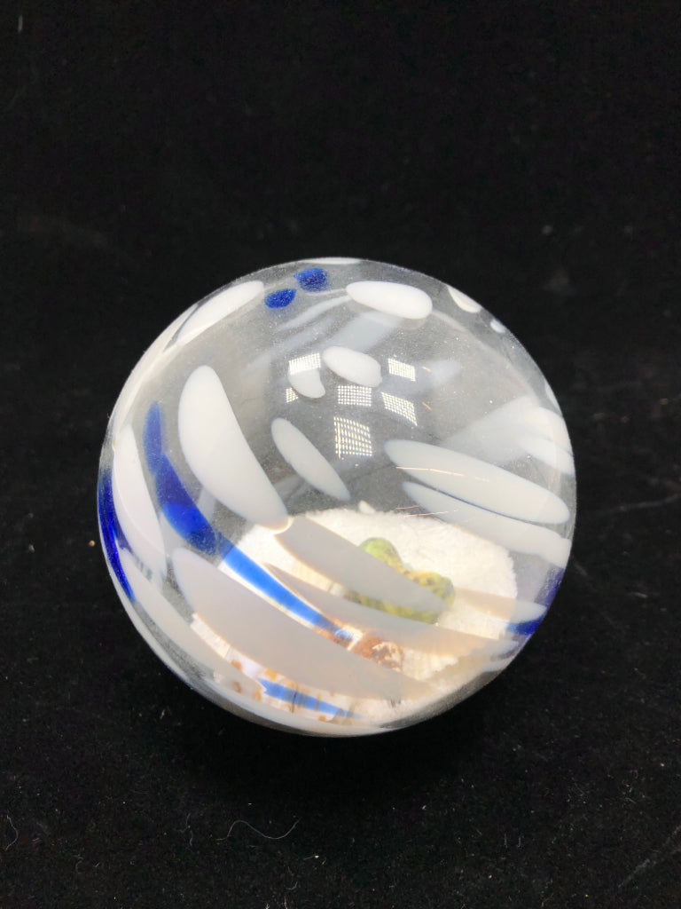 BLOWN GLASS BALL W/SAND AND SEASHELLS.