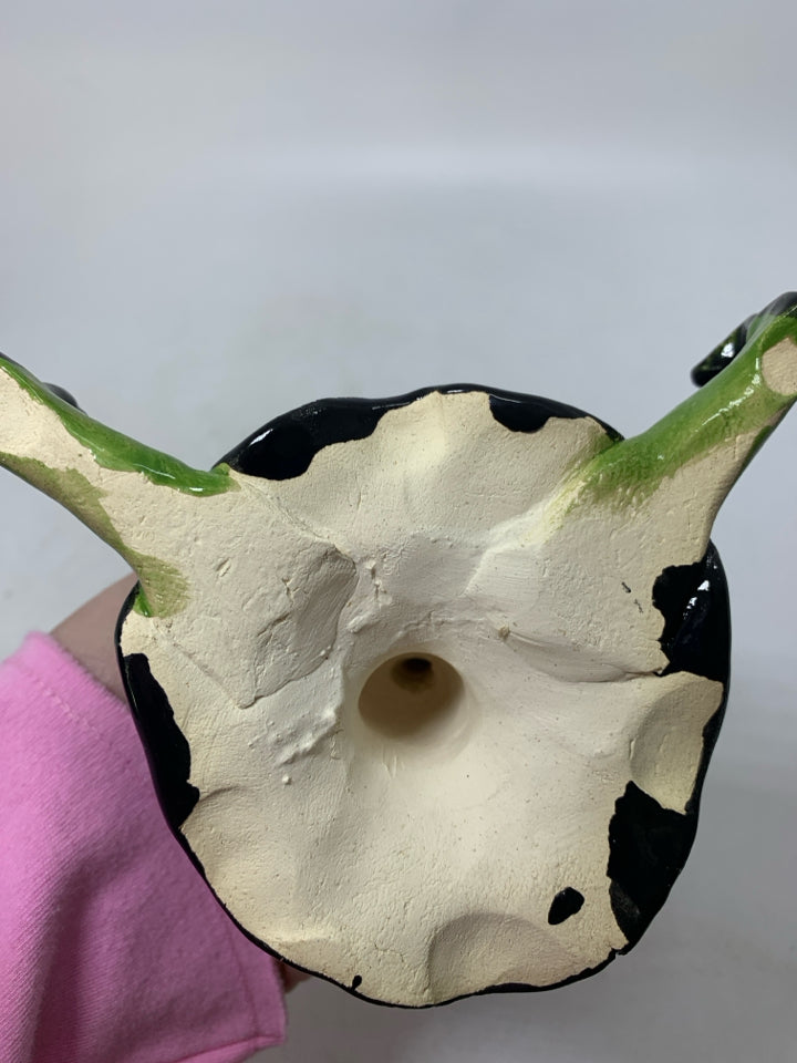 POTTERY WITCH HAT W/ GREEN LEGS IM MELTING FIGURE.