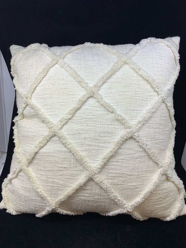 CREAM PILLOW W/DIAMOND TEXTURE.