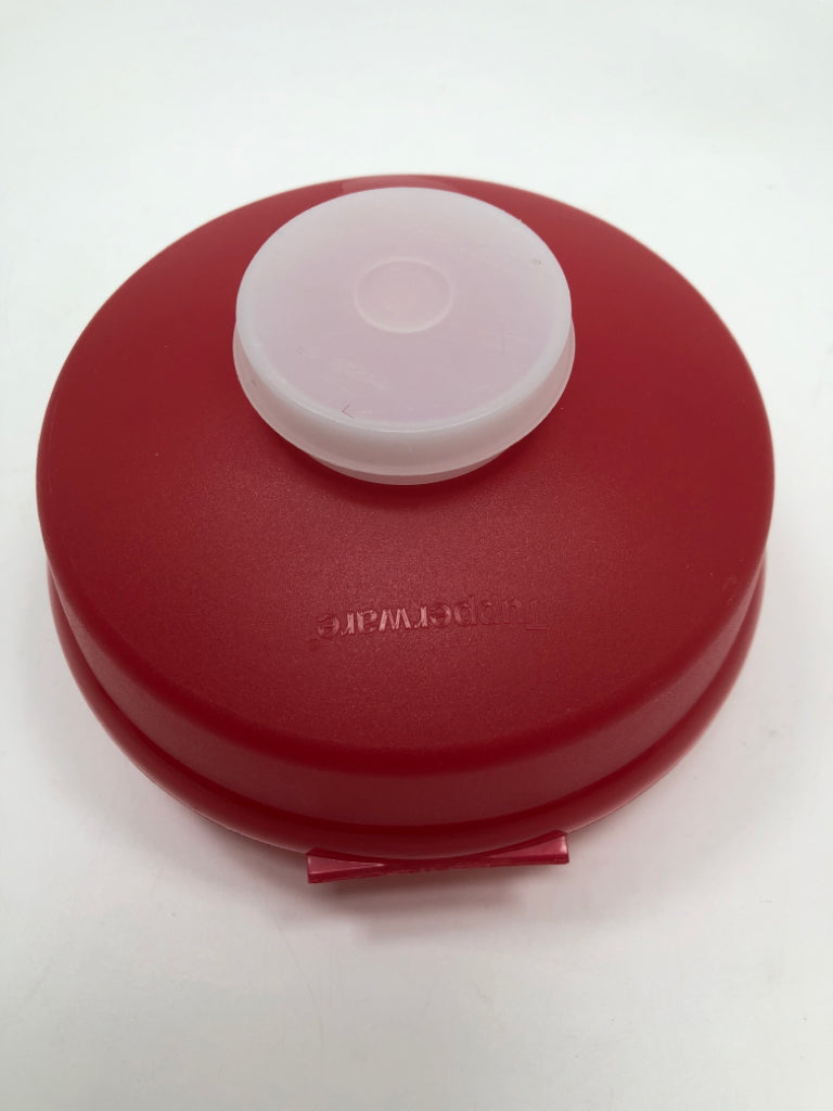 BAGEL CONTAINER W/SMALL CONTAINER ON TOP.