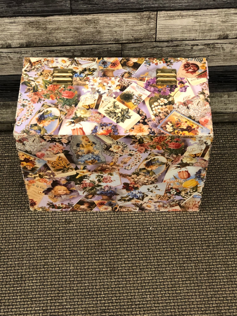 FLORAL CARDBOARD STORAGE BOX W/LOCKING FLIP LID AND HANDLES.
