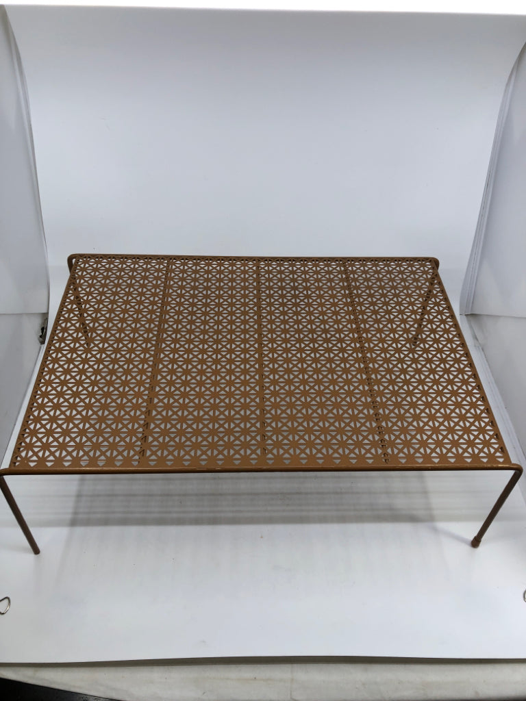 LIGHT BROWN METAL CABINET SHELF ORGANIZER W/ TRIANGLE PATTERN.