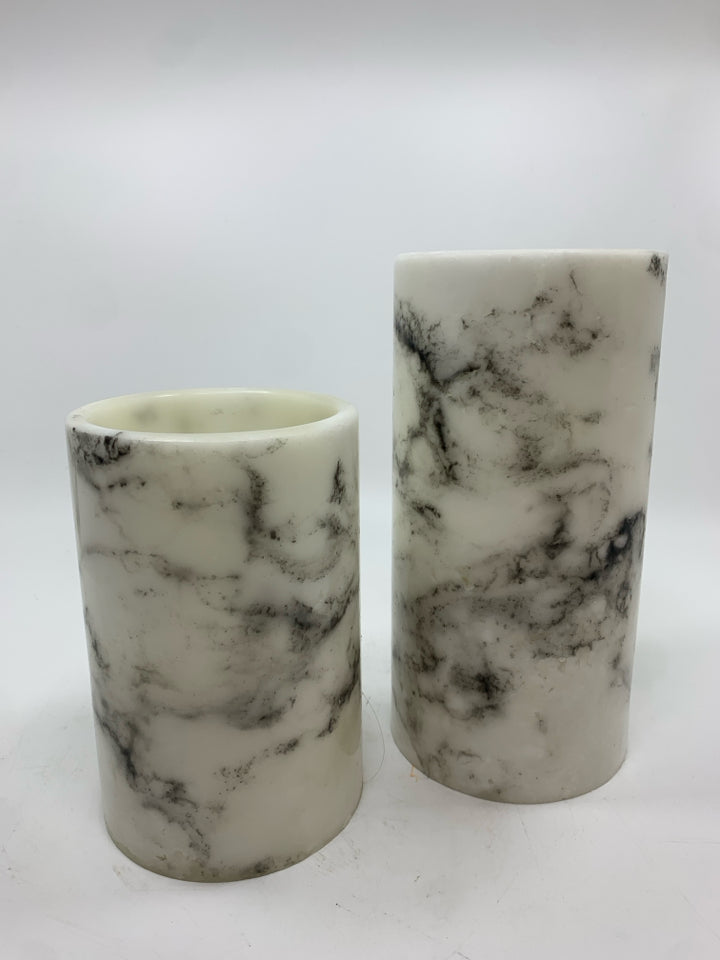 2 FAUX MARBLE RESIN LED CANDLES.