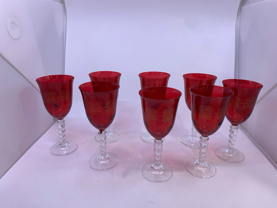 8 RED WINE GLASSES W/ GOLD DETAILS.