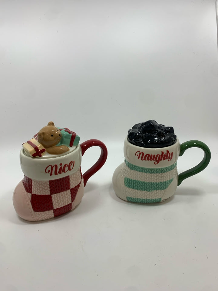 2 NICE/NAUGHTY MUGS W/LIDS.