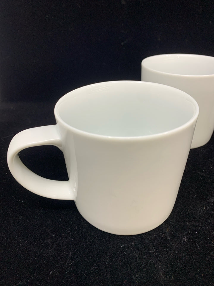 4 WHITE CRATE AND BARREL COFFEE CUPS.