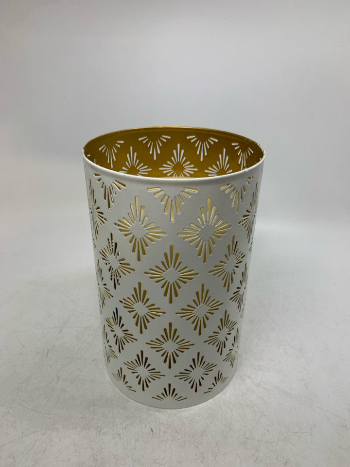 PIERCED METAL CYLINDER CANDLE HOLDER W/ FAUX PILLAR CANDLE.