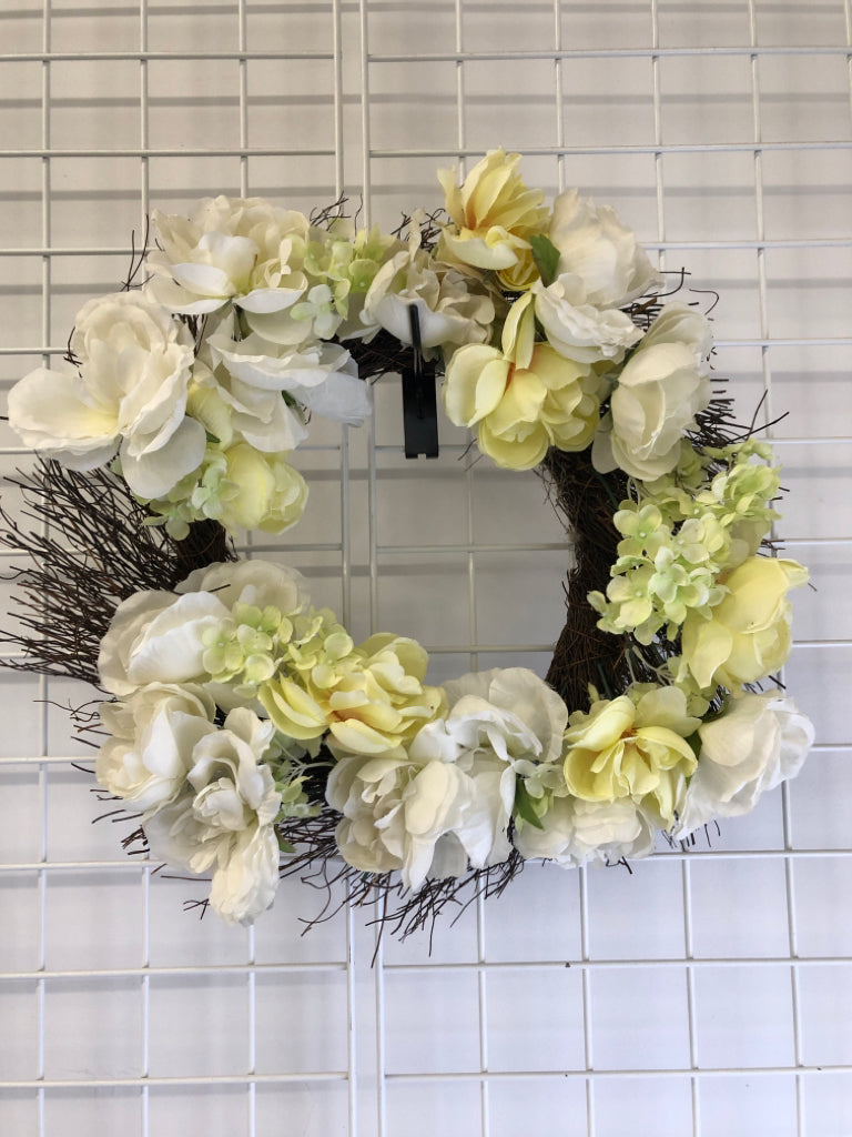 WHITE/YELLOW FLORAL WREATH.