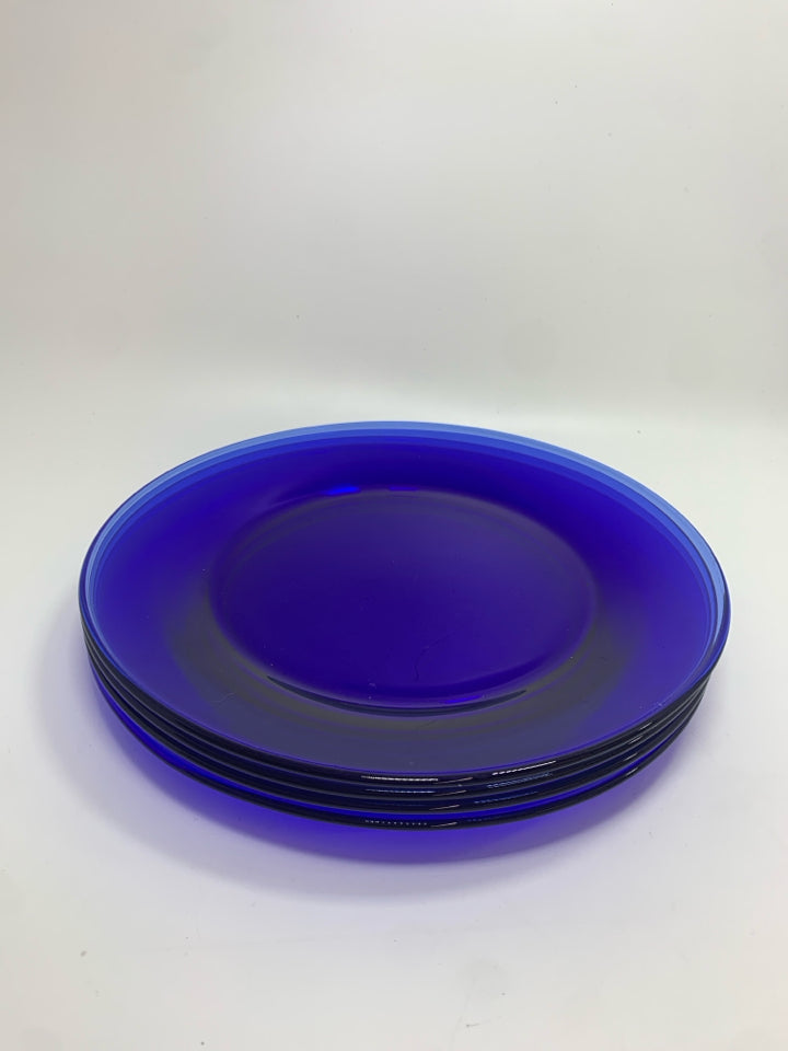 4 COBALT BLUE GLASS DINNER PLATES.