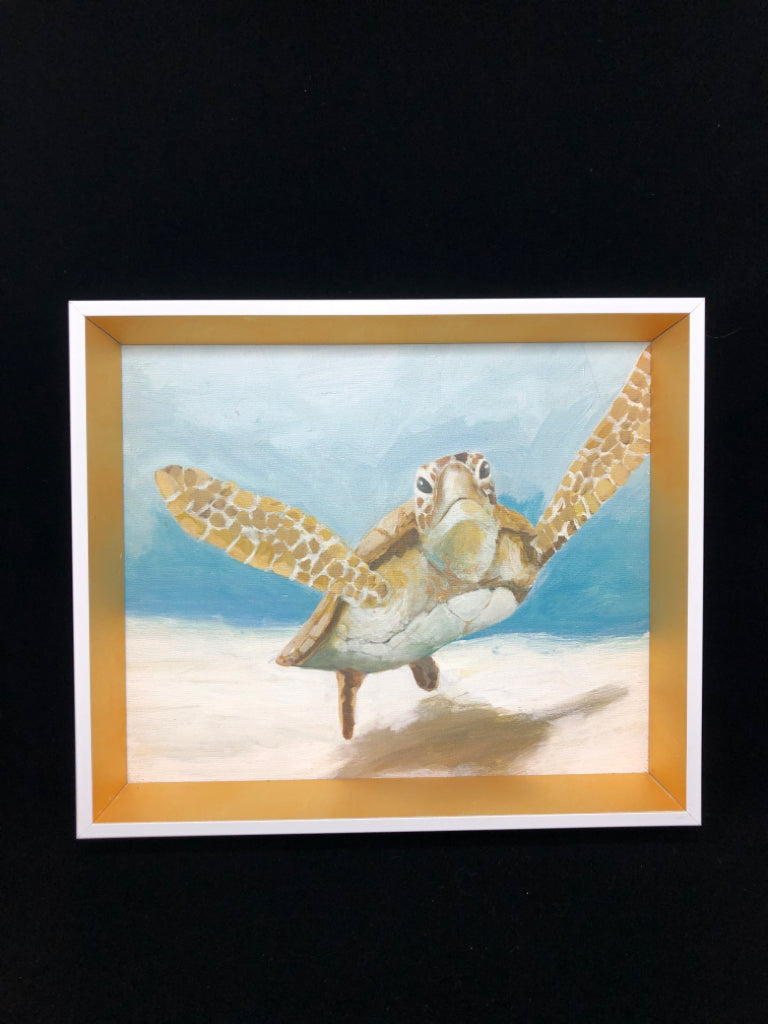 SWIMMING TURTLE PAINTING IN WHITE/GOLD FRAME.