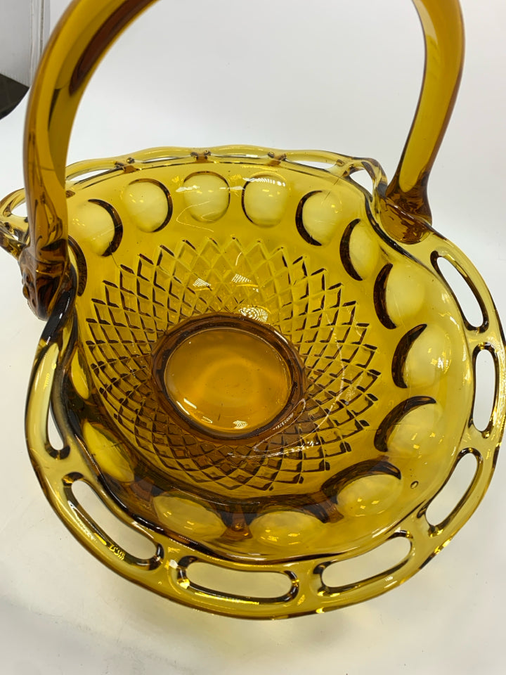 VTG AMBER GLASS BASKET W/RUFFLED EDGE.