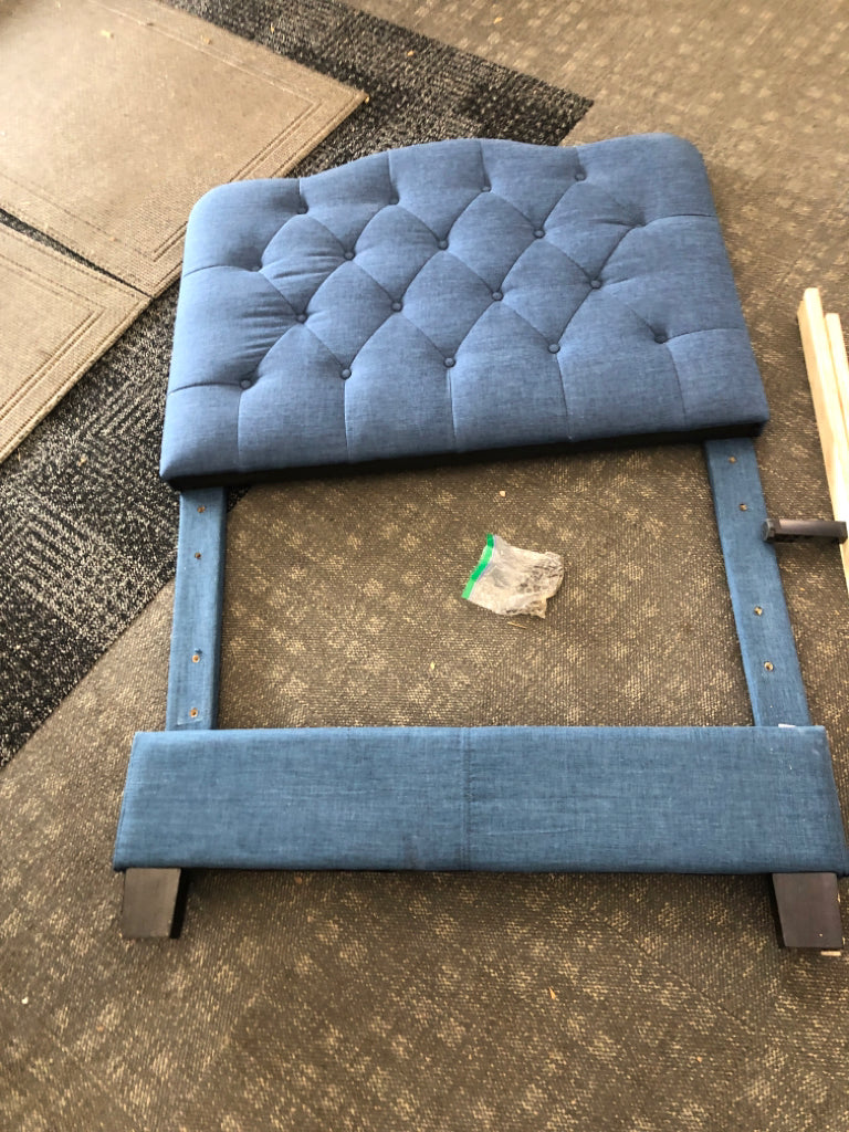 NAVY TWIN UPHOLSTERED FABRIC BED.