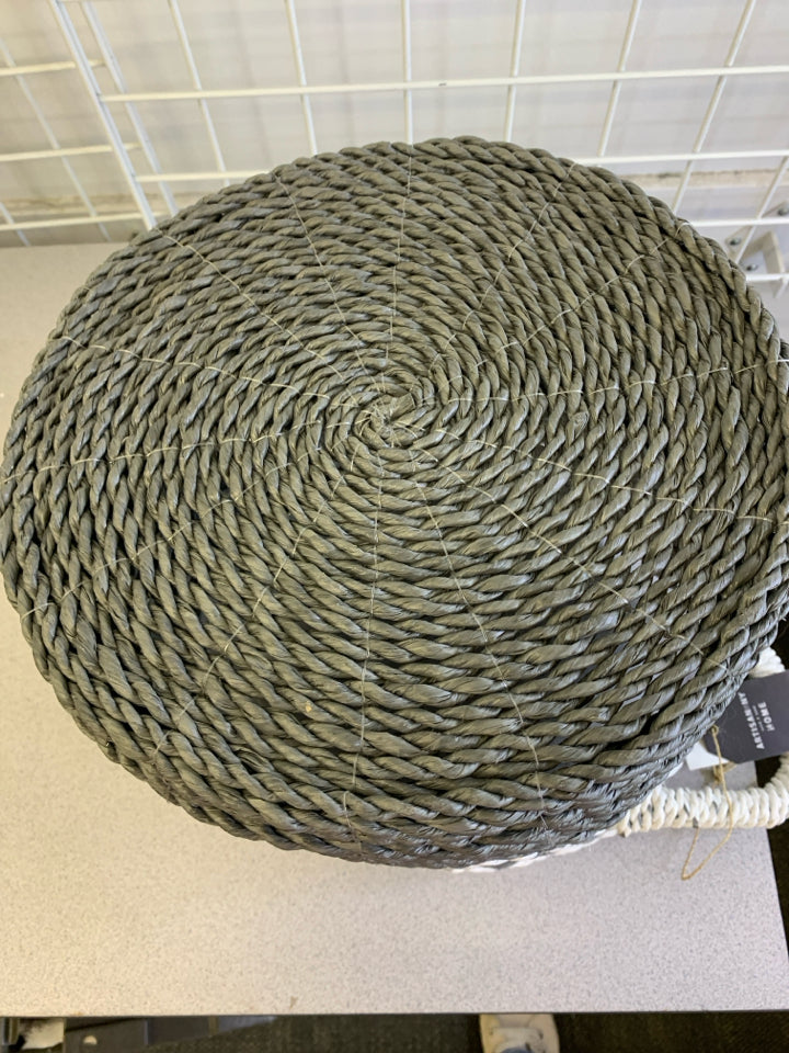 GREY/WHITE WOVEN BASKET WITH HANDLES.