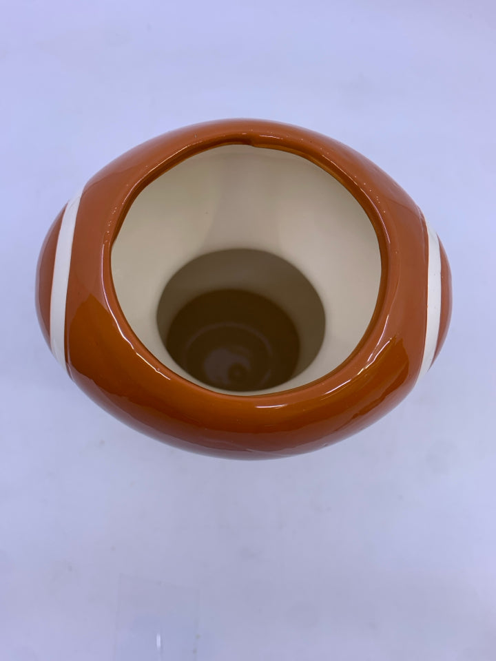 STACKED FOOTBALL CERAMIC VASE.
