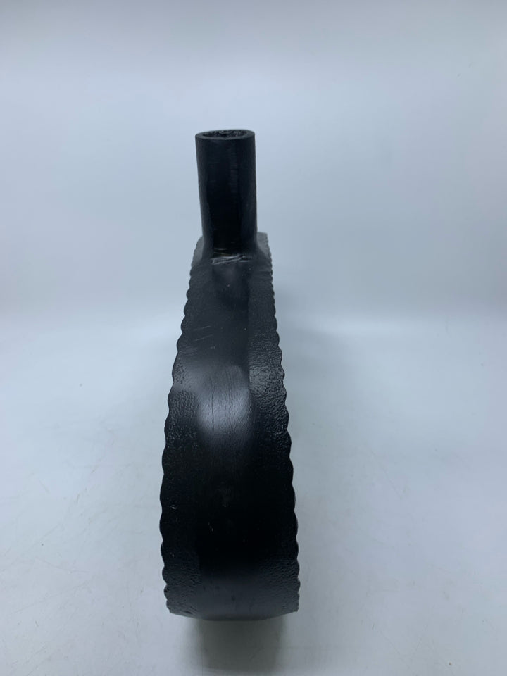 LARGE BLACK RIBBED METAL DONUT HOLE VASE.