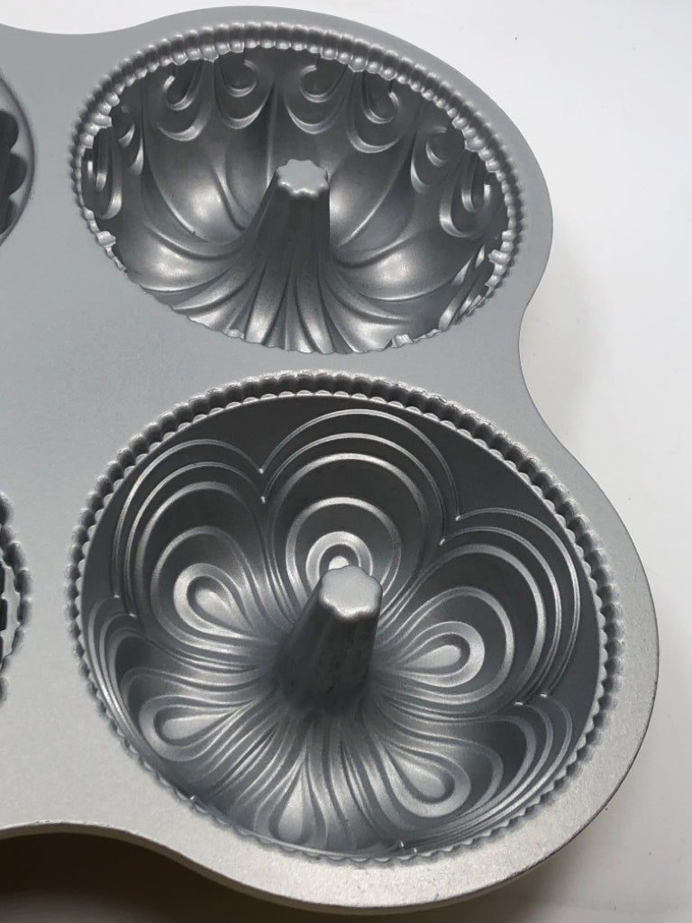 4 CAVITY BUNDT QUARTET CAST ALUMINUM.