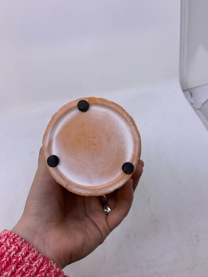 TERA COTTA PLANTER W/ SKINNY LEAVES + ROCK FILLER.