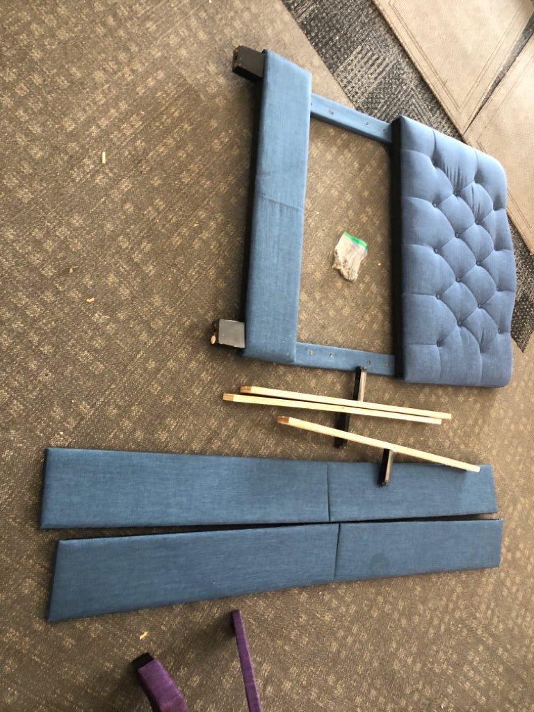NAVY TWIN UPHOLSTERED FABRIC BED.