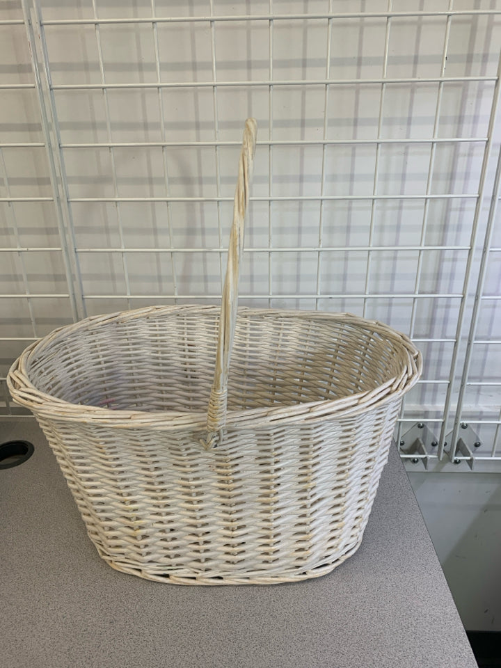 TALL WHITE WICKER BASKET W/HANDLE.