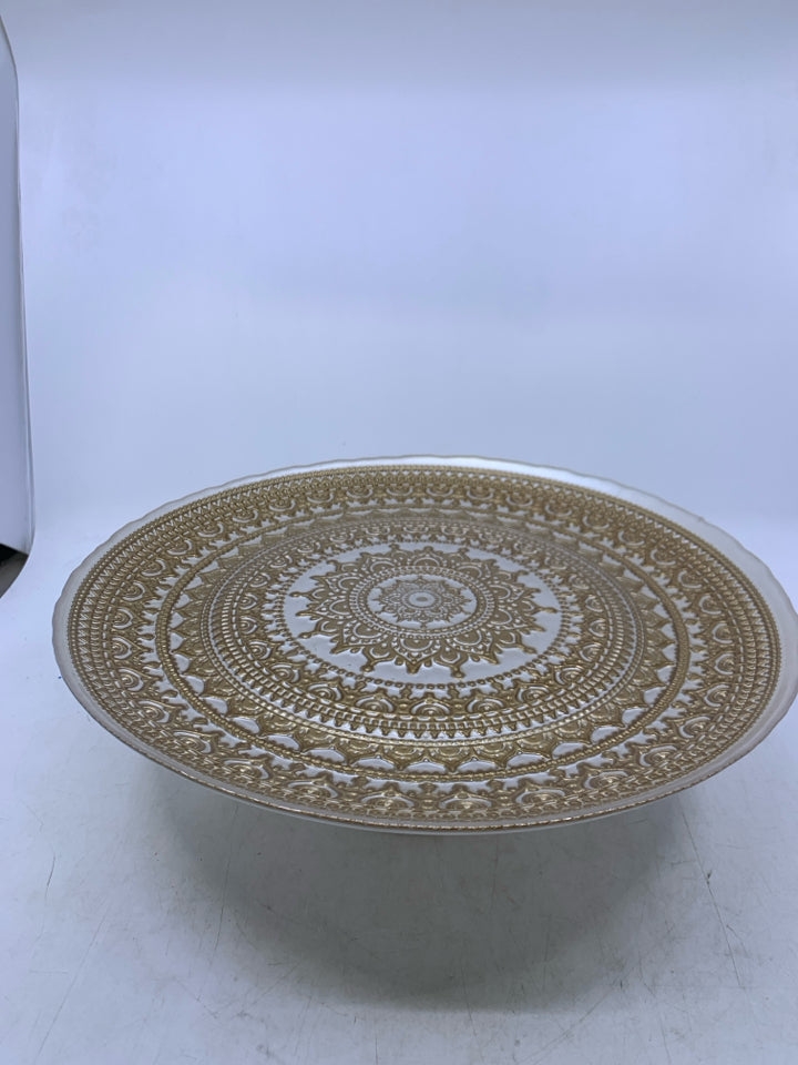 WHITE GLASS FOOTED CAKE STAND W/ GOLD EMBOSSED DESIGN.