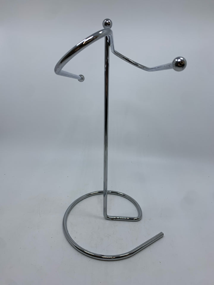 SILVER METAL TOWEL HOLDER.