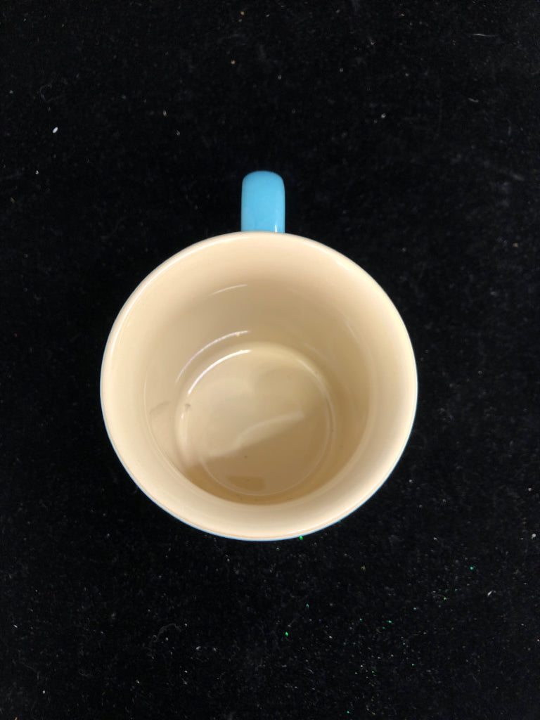 AQUA LE CREUSET MUG.