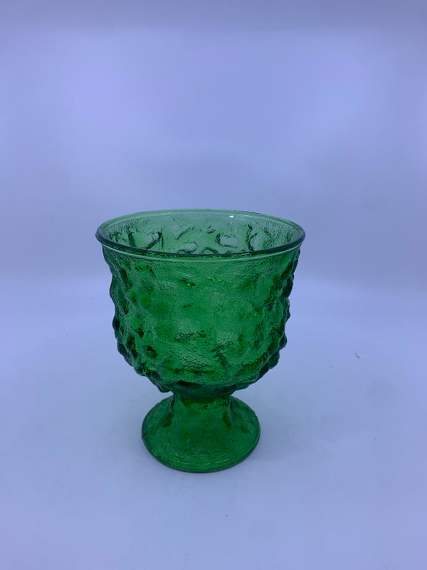 FOOTED GREEN GLASS TEXTURED VASE.