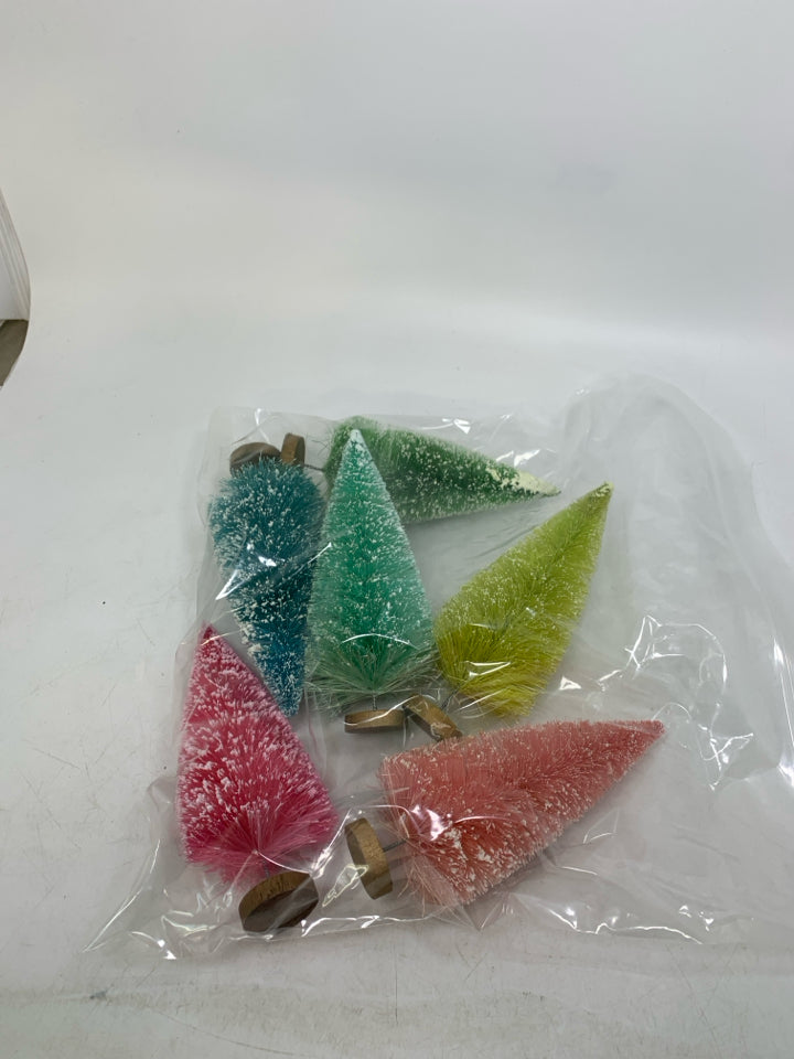 6 ASSORTED COLORED BRUSH TREES IN BAG.