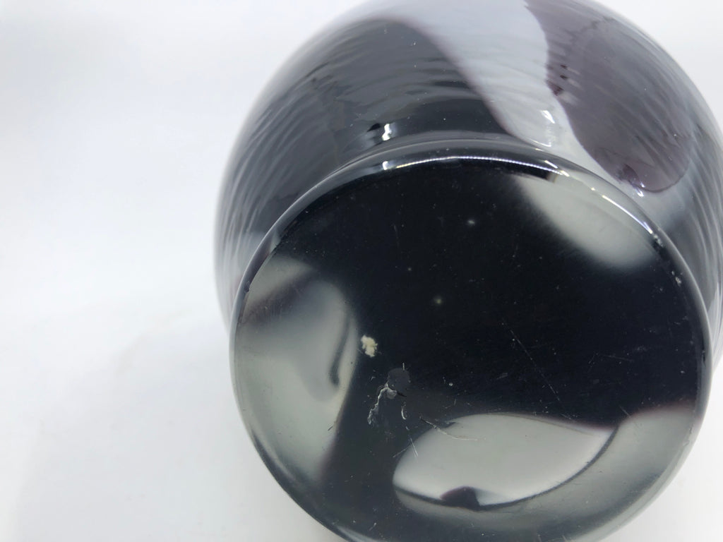 BLACK AND WHITE W PURPLE ACCENT GLASS VASE.