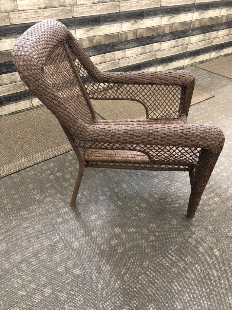 BROWN WICKER OUTDOOR CHAIR.