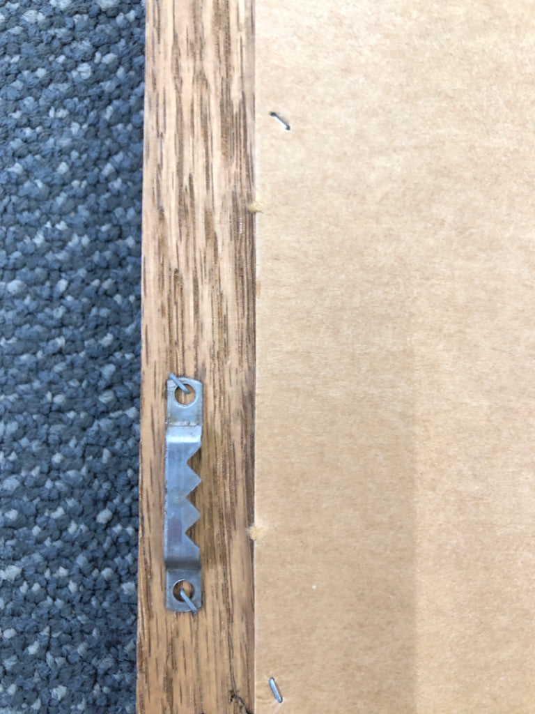 WALL MIRROR W/WOOD BORDER.