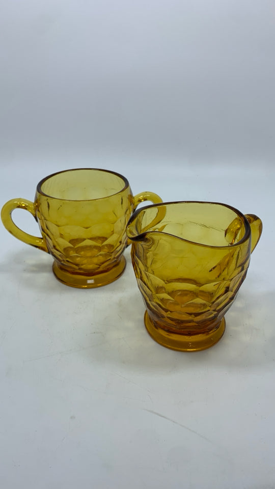2PC AMBER GLASS SUGAR AND CREAMER SET.