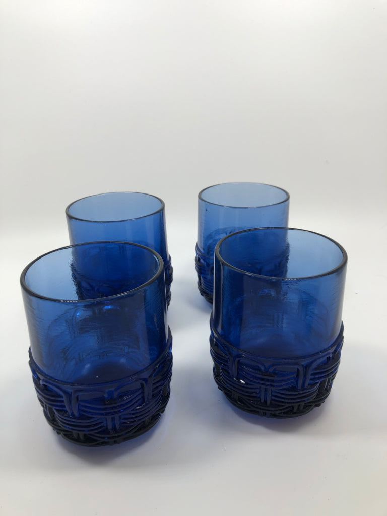 4 BRAIDED BLUE GLASS TUMBLERS.