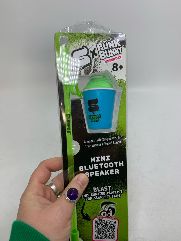 NIP GREEN DAY MINI BLUETOOTH SPEAKER SHAPED AS SLURREE CUP.